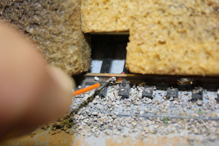 Solder power tap to train track